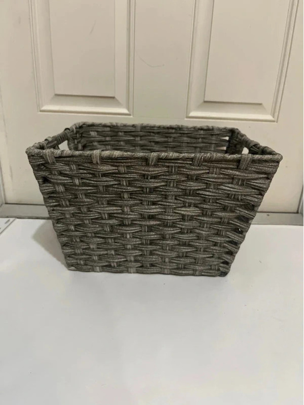 Grey weaved basket for storage organizing